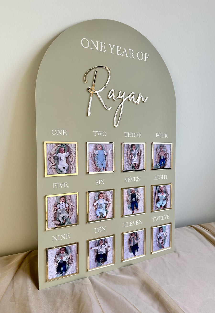 Personalised acrylic baby milestone board in white, celebrating first birthday.
