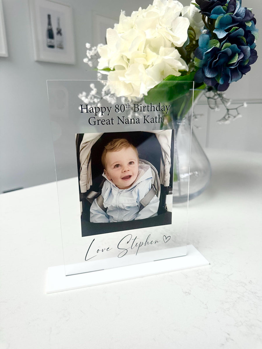 Personalised acrylic photo frame with custom engraving, clear and rectangular shape