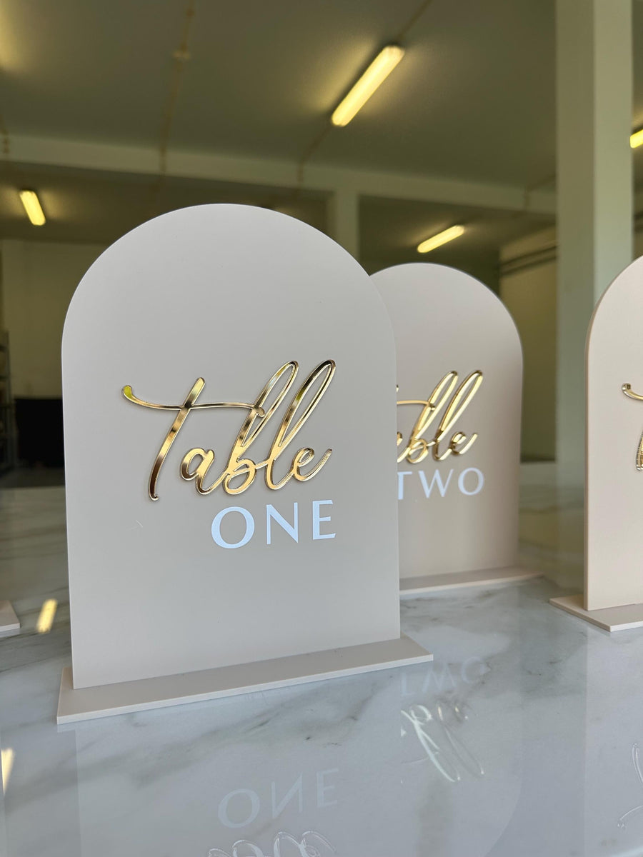 Custom 3D acrylic arched table numbers in clear perspex for weddings