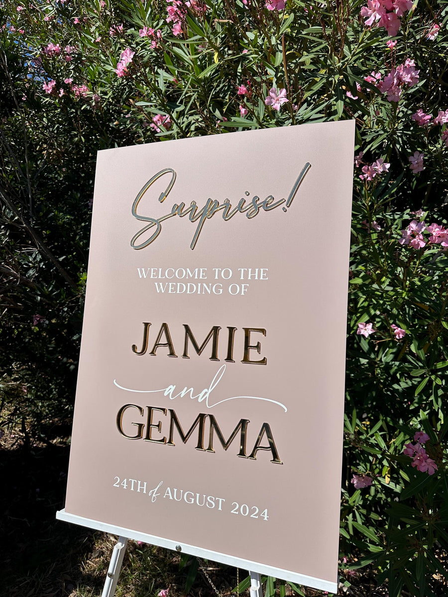 Surprise Wedding Welcome Sign made of clear acrylic with elegant 3D lettering