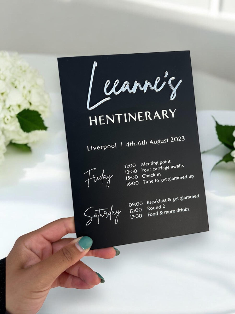 Custom acrylic hen do itinerary sign with elegant typography, clear background