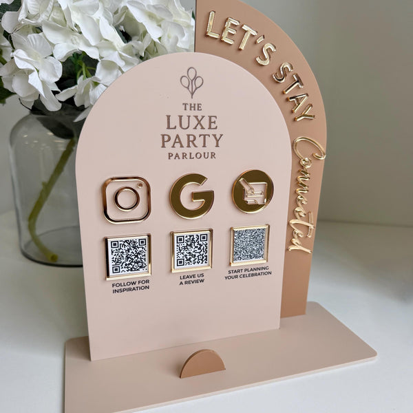 Acrylic social media sign with double arch design and QR code holder