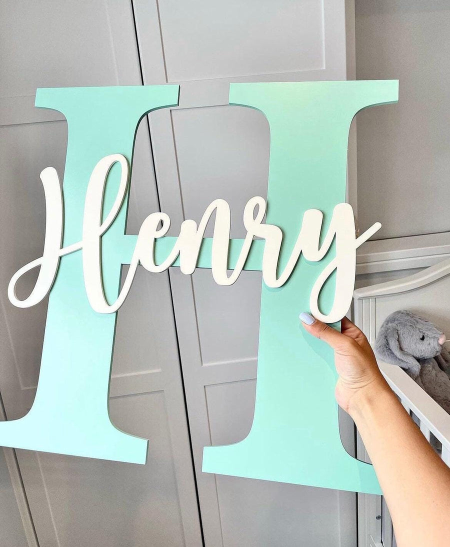 Custom initial and name wooden wall plaque in light wood, modern nursery decor