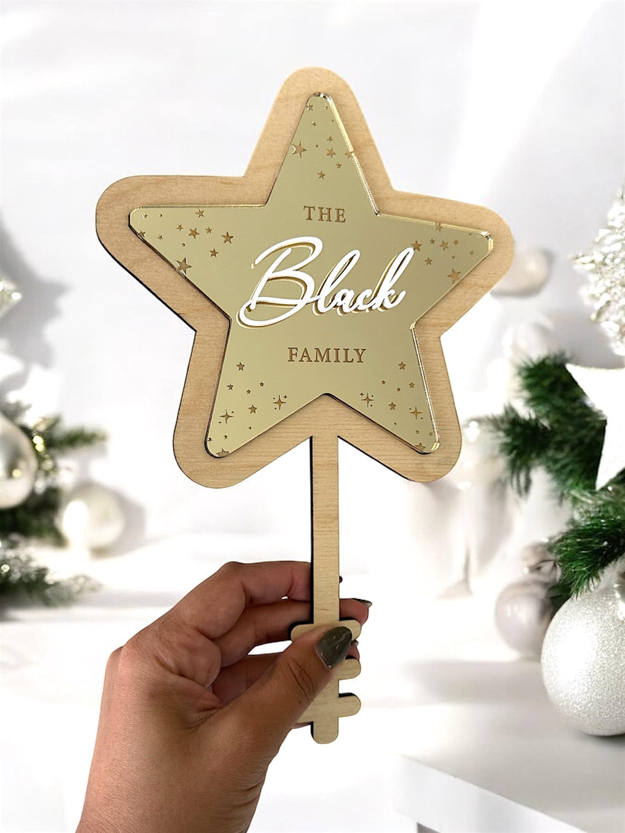 Acrylic personalised Christmas tree topper in star shape, custom family decoration