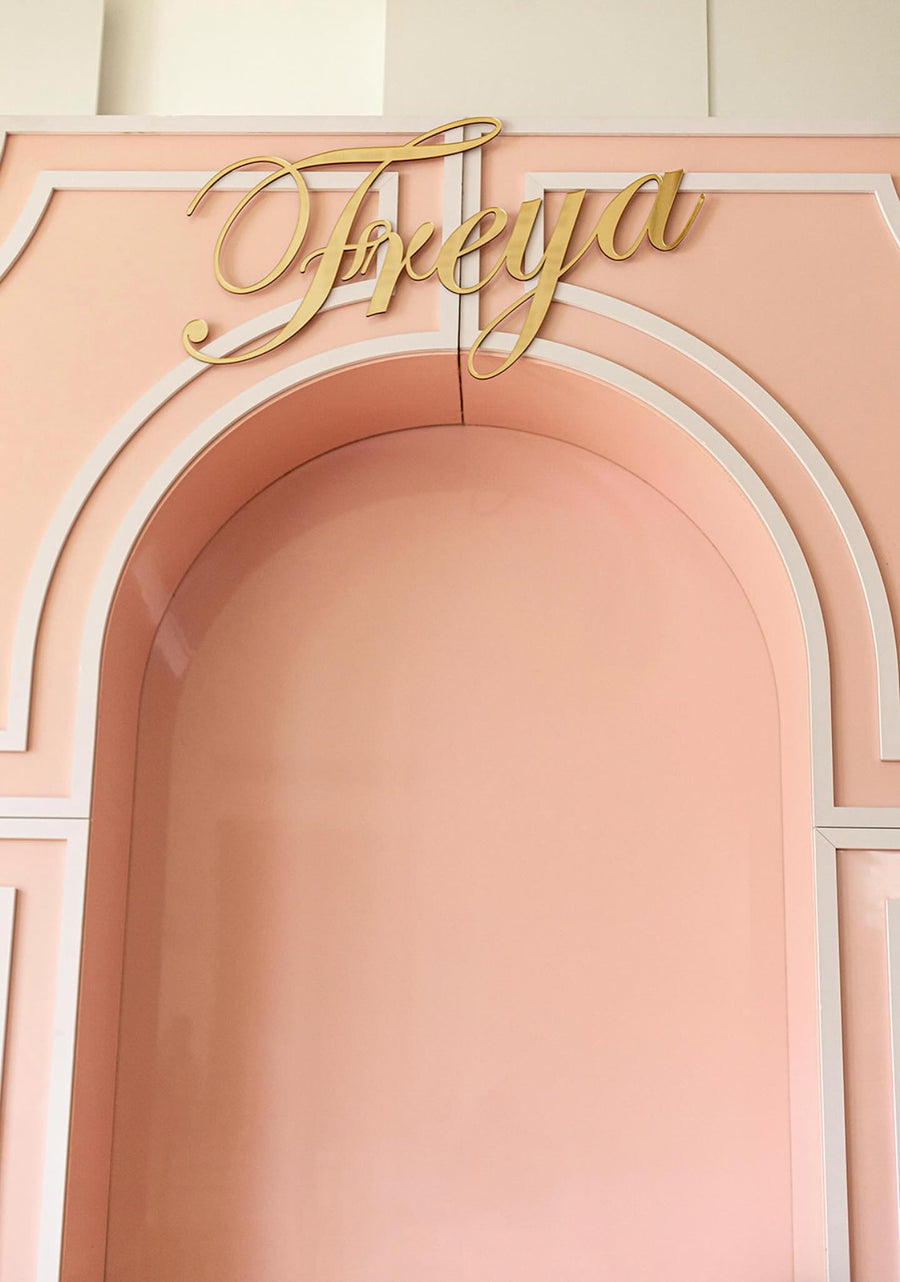 Acrylic name sign in clear material, personalized with custom lettering
