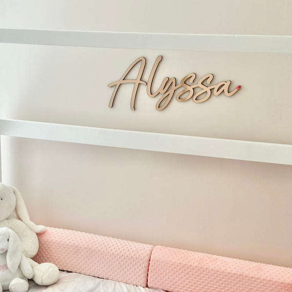 Acrylic name sign in clear acrylic, customized with elegant lettering.