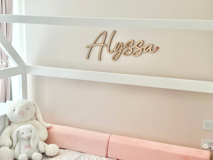 Acrylic name sign in clear acrylic, customized with elegant lettering.