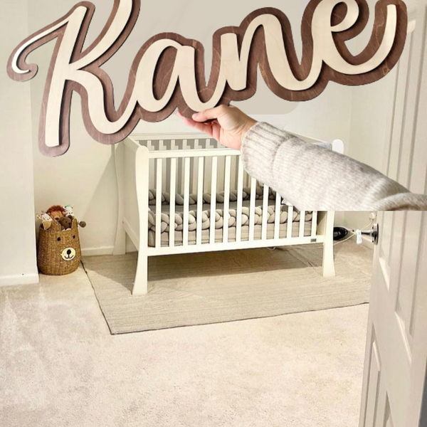 Double Layered Name Sign in elegant wood with a personalized design