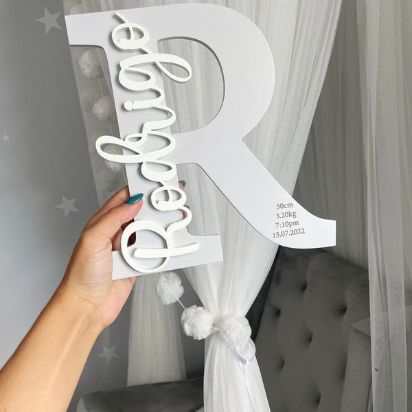 Engraved personalised initial pendant in silver with a round shape