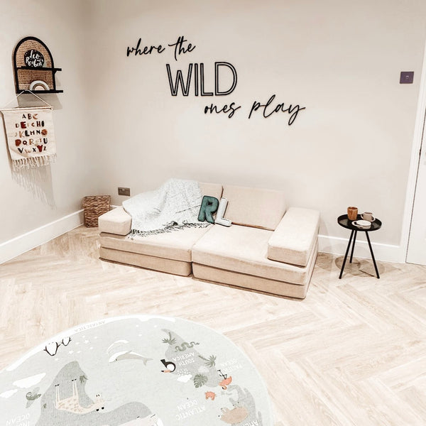 Wooden wall sign 'Where the WILD Ones Play' in dark brown color