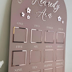 Custom first birthday photo board with flower theme and milestone photos