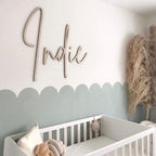 Custom nursery name sign in elegant wood, ideal for kids' room decor