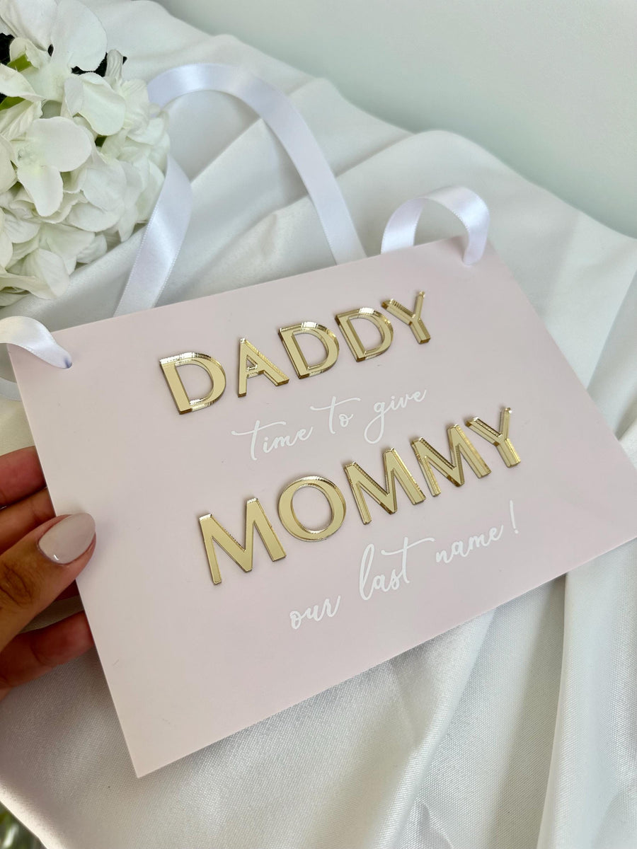 Acrylic page boy sign, white lettering on clear background, wedding ceremony use