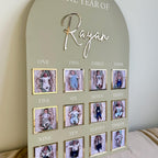 Personalised acrylic baby milestone board in white, celebrating first birthday.