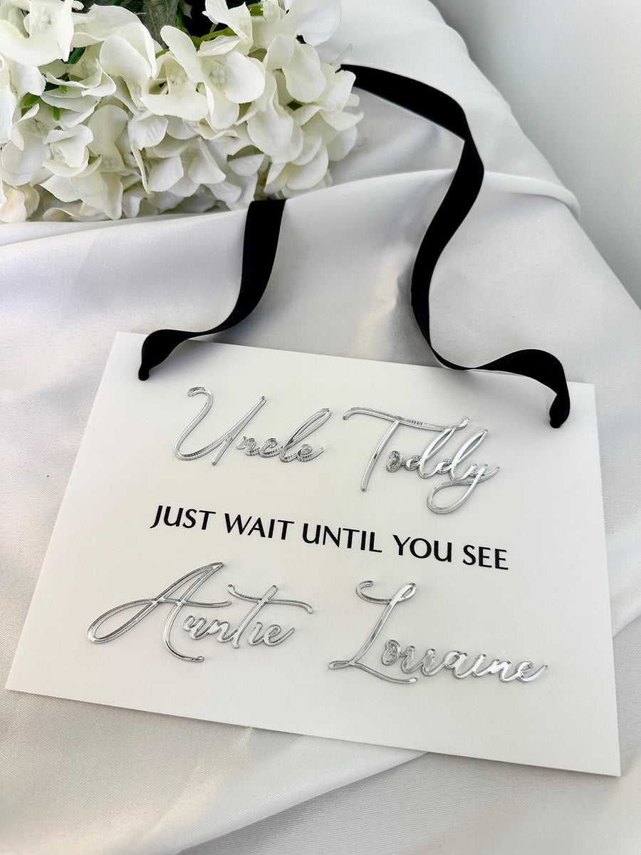 Custom acrylic page boy sign in clear, personalized for weddings