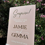 Surprise Wedding Welcome Sign made of clear acrylic with elegant 3D lettering
