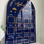 Custom first birthday photo board with stars and clouds design