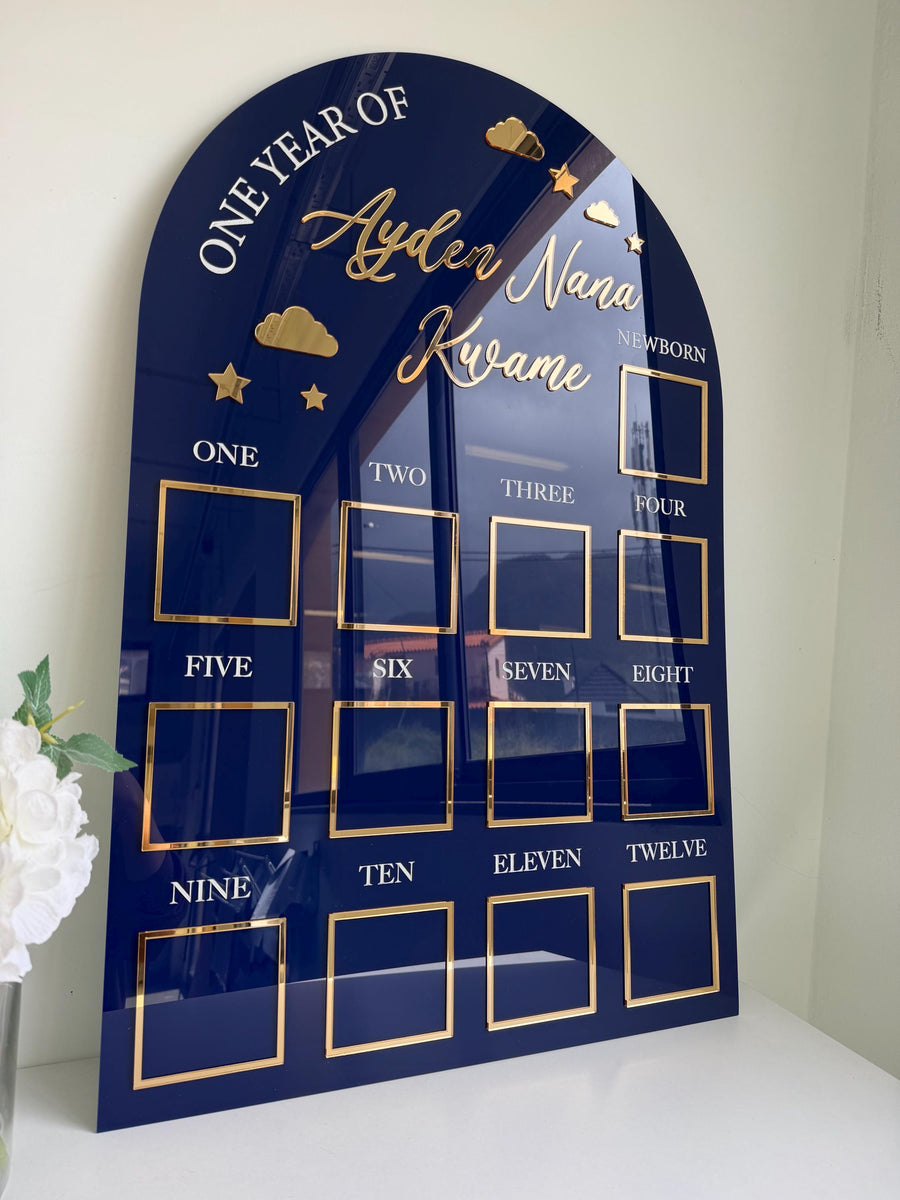 Custom first birthday photo board with stars and clouds design