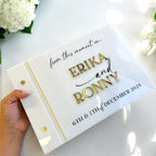 Personalised acrylic wedding guestbook with crystal pen, elegant design and clear material.