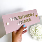 Modern 3D acrylic Perspex logo sign for spa room, wall-mounted with stand offs