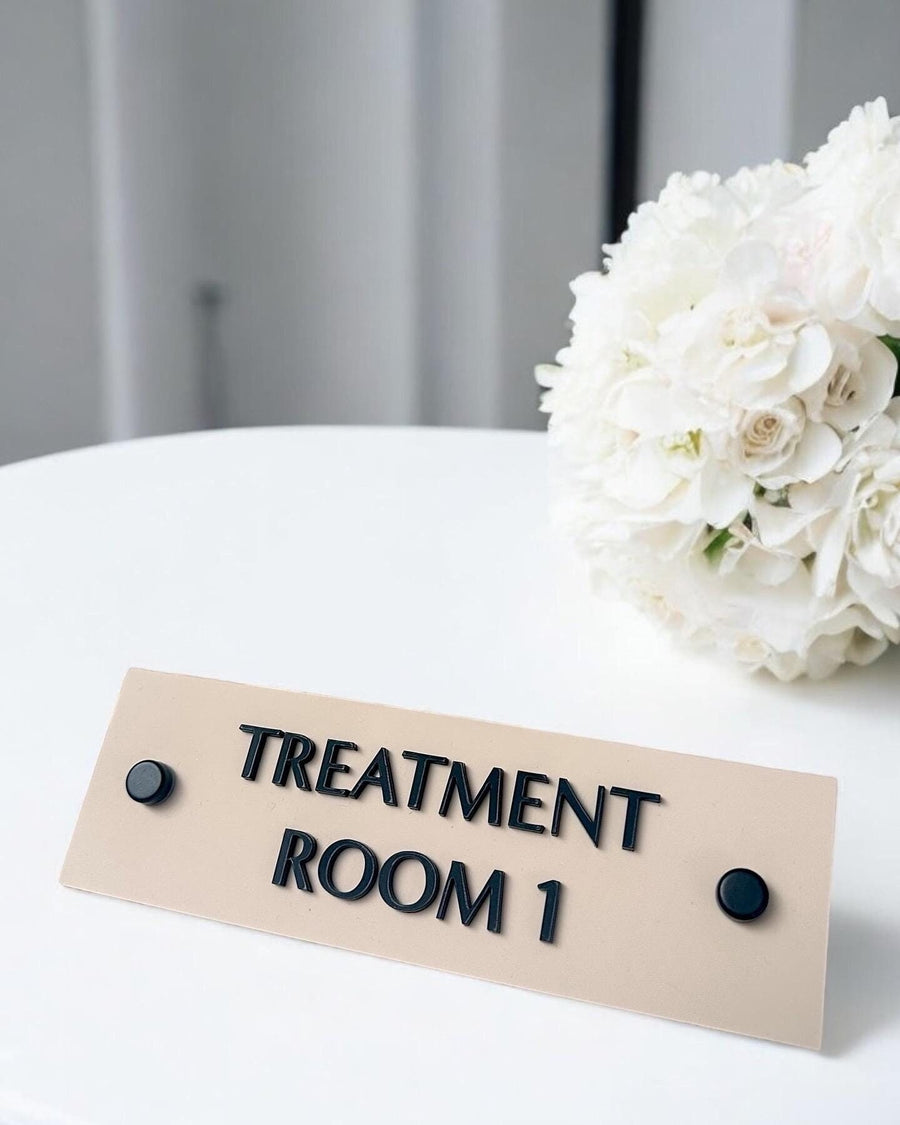 Custom 3D acrylic treatment room sign in clear with modern design