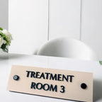 Custom 3D acrylic treatment room sign with modern design and stand offs