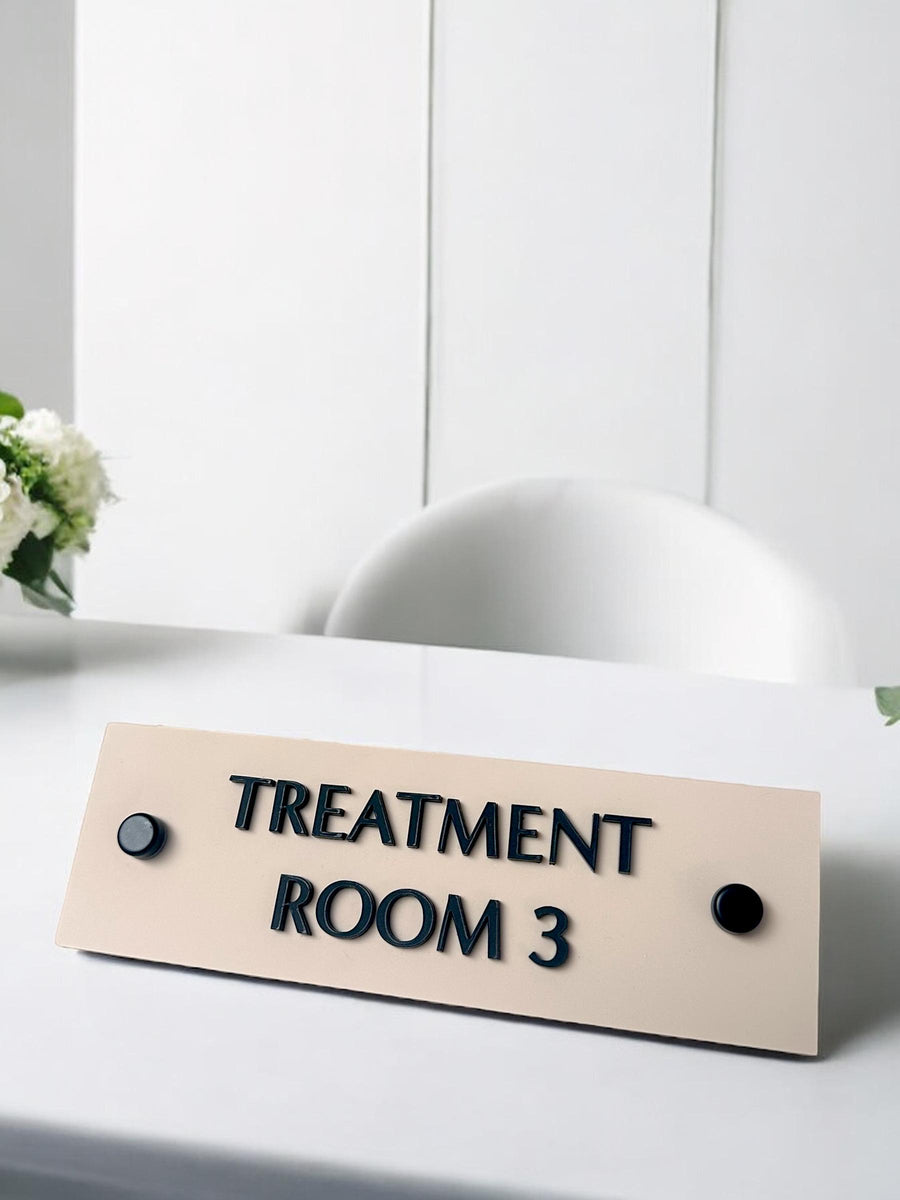 Custom 3D acrylic treatment room sign with modern design and stand offs