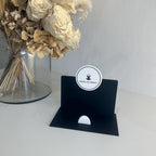 Clear acrylic business card holder with logo branding and sleek design