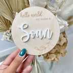 Personalised wooden birth announcement disc with custom name and 3D design
