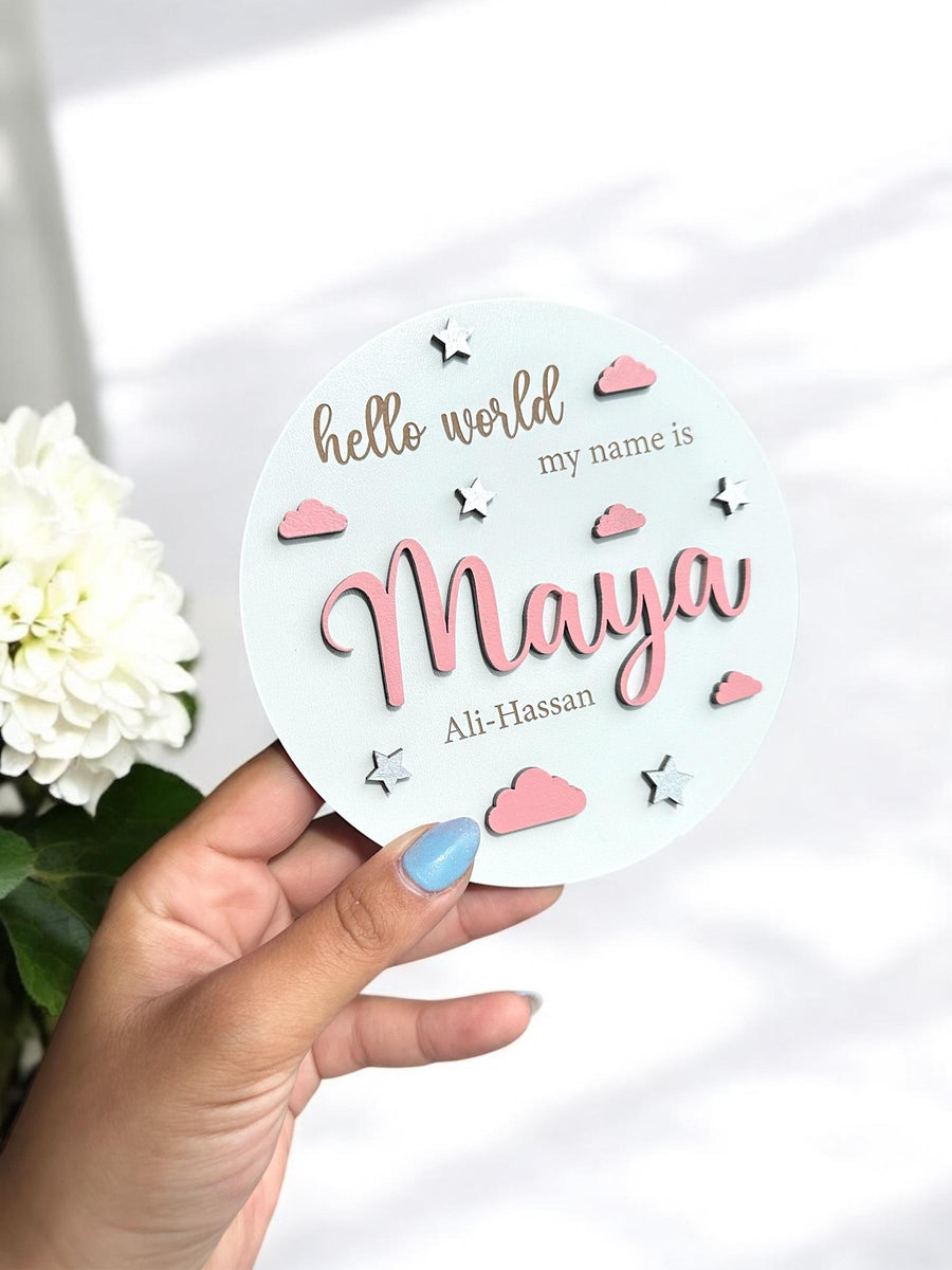 Personalised 3D baby name announcement disc in natural wood, nursery decor