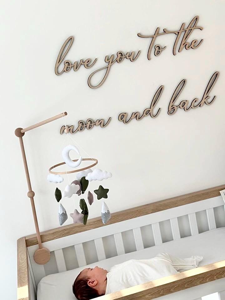 Custom wooden laser cut nursery sign in light wood, moon and stars design