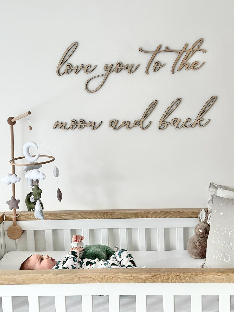 Custom wooden laser cut nursery sign in light wood color
