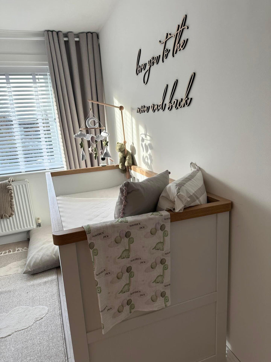 Custom wooden laser cut nursery sign in light wood, moon and stars design
