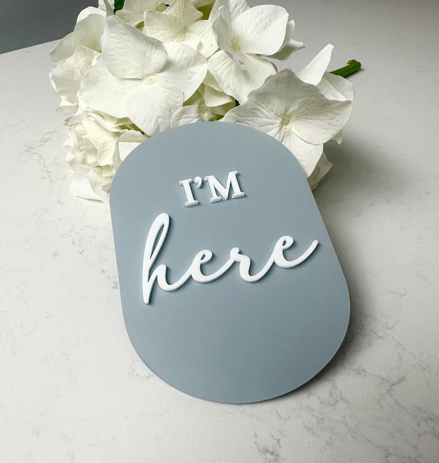 Acrylic I'm Here birth announcement disc in light pastel colors