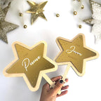 Personalized acrylic Christmas tree topper in star shape, family name design