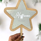 Acrylic personalised Christmas tree topper in star shape, custom family decoration