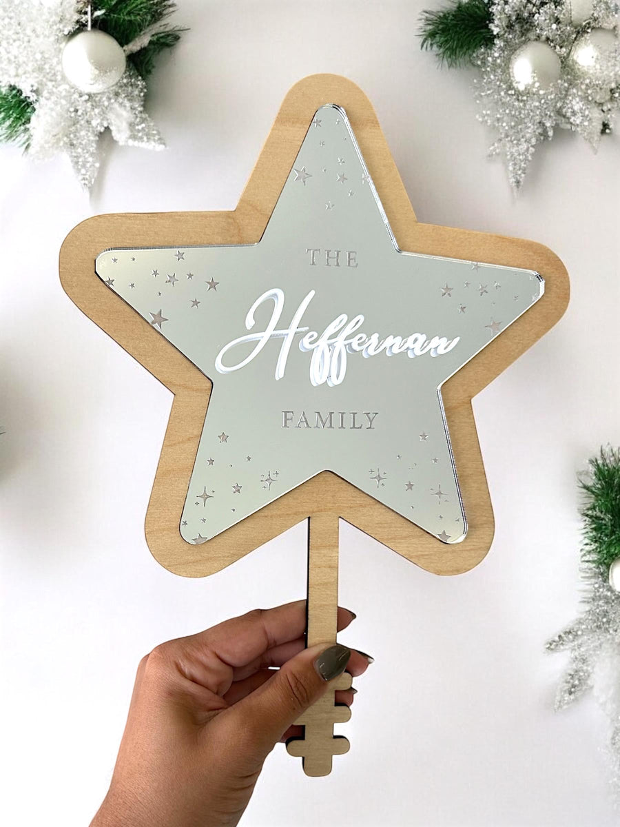 Acrylic personalised Christmas tree topper in star shape, custom family decoration