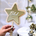 Personalised acrylic Christmas tree topper in star shape, custom family decoration
