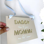 Page Boy Sign, white wooden plaque with black text for wedding ceremony.