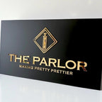Minimalist business logo sign in sleek black design for office reception