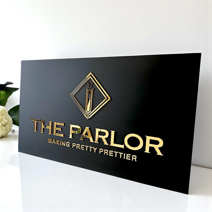 Minimalist business logo sign in sleek black design for office reception