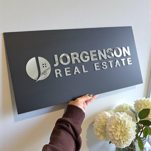 Luxury 3D acrylic logo signage in clear and black for modern salons