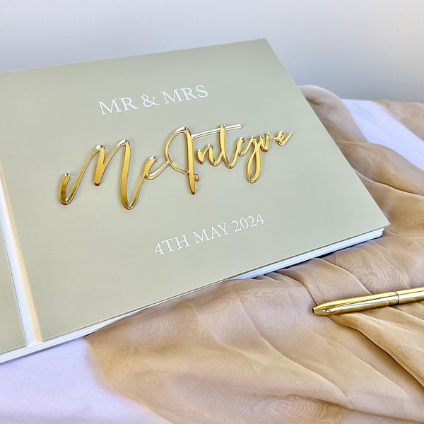 Personalised acrylic wedding guestbook with a crystal pen, elegant clear design