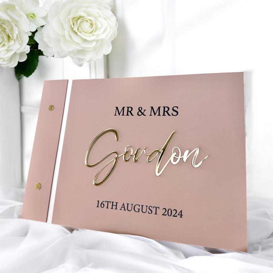 Custom acrylic wedding guestbook with crystal pen, elegant clear design