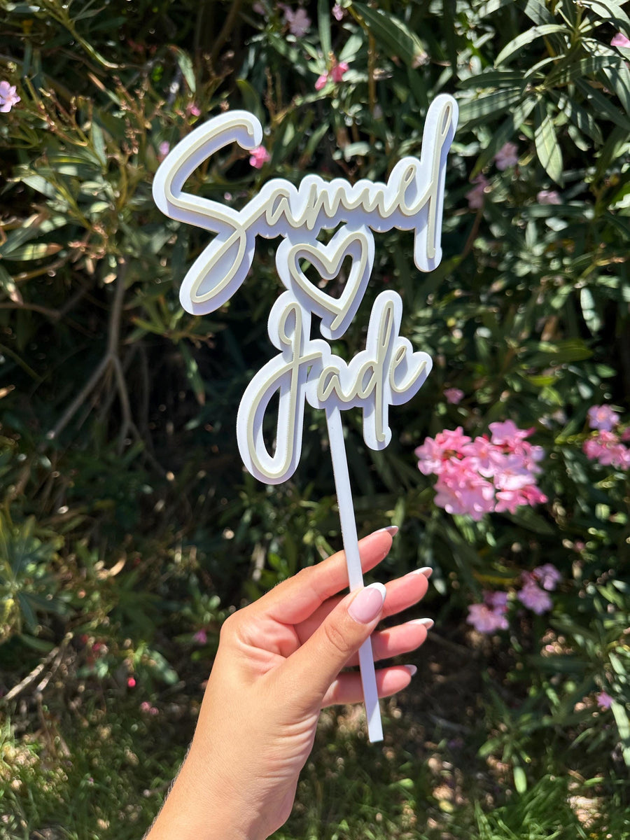 Personalised acrylic wedding cake topper in elegant double layered design